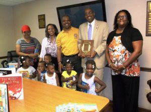 PHOTO 1 - SHORE UP! Receives Donation of 1,650 New Children's Books from Omega Psi Phi