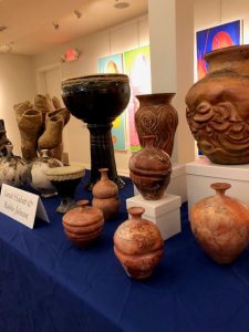 assortment of ceramic pottery on table