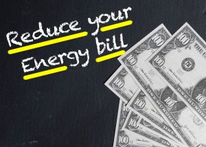 Reduce your Energy bill text with US dollar banknotes Reduce your Energy bill text with US dollar banknotes