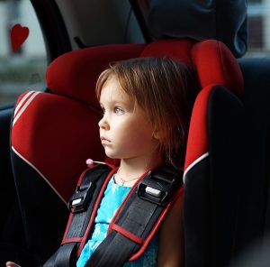 thumbnail_Child-in-auto-baby-seat-in-car-12137609