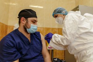 Uzhgorod, Ukraine - March 11, 2021: A Doctor Immunizes Health Wo