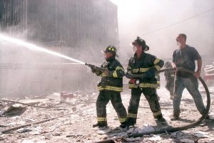 NEW YORK - SEPTEMBER 11:  New York City firefighters work near t