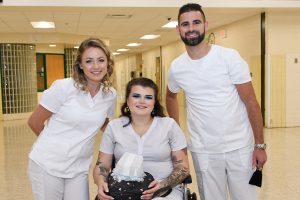 RNS PREPARE: From left, Diana Nelson of Berlin, Katie Ervin of Salisbury and Michael Glick of Berlin get ready for the Wor-Wic Community College nursing awards and recognition ceremony.