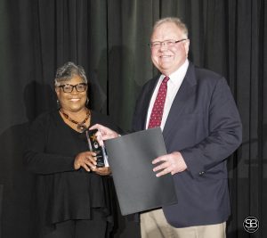 Sharon Morris, First Shore Federal, presented the SACC Hall of Fame Award to Martin Neat
