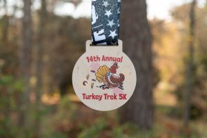 medal that reads 14th Annual Turkey Trek 5K