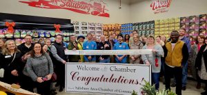 Group of people at a Ribbon cutting