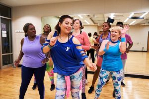 group of women exercising in gym