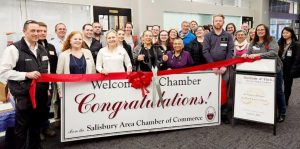 group of attendees at ribbon cutting