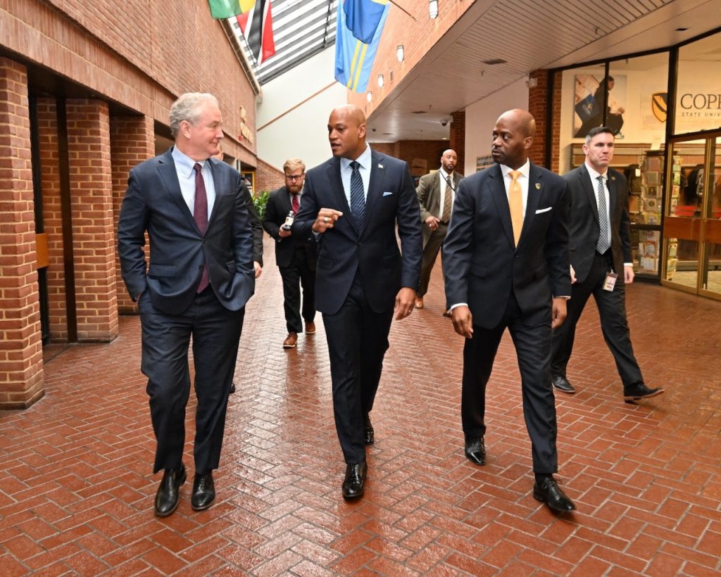 men walking through coppin state university