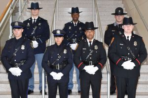 police officers standing on stairs