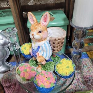 easter bunny statue with cupcakes