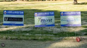 3 ad signs on golf course