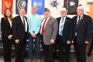 group of veterans standing with wor-wic-executive director