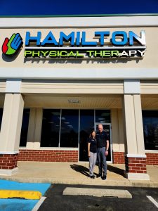 two people standing outside Hamilton Physical Therapy