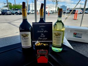 Three bottles of wine on a table