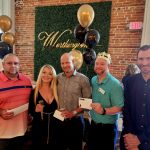 Door prize winners L-R Rob Fuller, Chris Phillips, Corey Boerner and David Engelhardt with Holly Worthington