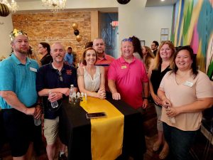 L-R Corey Boerner, Joe Bean, Christina & Rob Fuller, Tim Arnett, Bonnie Flinn and Li-Ann Piposzar