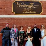 Worthington Realty Group, L-R, Josh Rose, Daisy Rose, Alana Coffey, Holly Worthington (with daughter Camelia), Colin Eck and Stacie Walsh