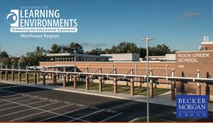 exterior of rock creek school with becker morgan group logo