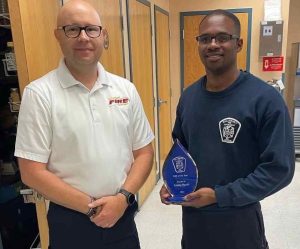 salisbury emt receiving award by assistant chief