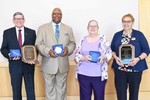 wor-wic-community college retirees holding awards