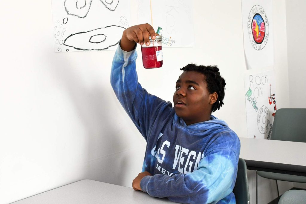african american student in chemistry class