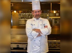 chef standing in kitchen