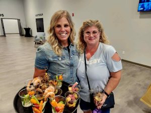 Woman holding a tray of hors d'oeuvres