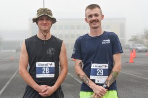 Two young men in short sleeve shirts outside Wor-Wic for the 5K Race