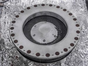 Large circular metal piece of equipment from NASA