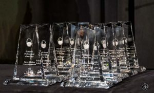 group of glass awards on table