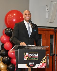 Maryland Governor, Wes Moore, giving a speech behind a podium