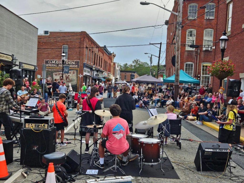Musicians playing live music in the middle of the street in Salisbury, MD