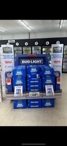 Interior of a liquor store wit a bud light truck