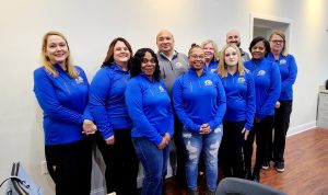 Eastern Shore Primary Care & Wellness team in blue shirts