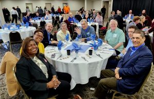 Salisbury Chamber of Commerce members sitting around a circular table