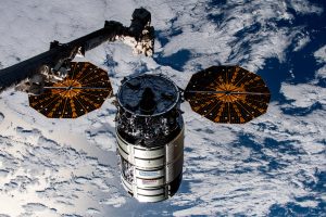 Northrop Grumman’s Cygnus cargo craft is pictured moments away from being captured by the Canadarm2 robotic arm controlled by NASA astronaut and Expedition 69 Flight Engineer Woody Hoburg from inside the International Space Station.