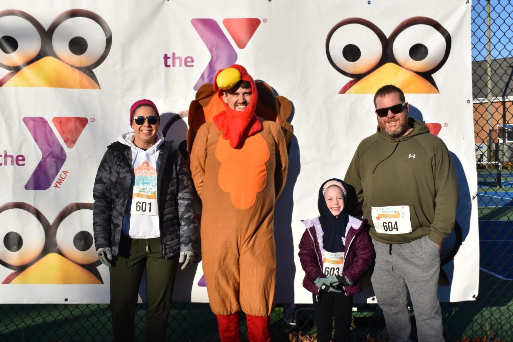 Family dressed up for the YMCA Turkey Trot 