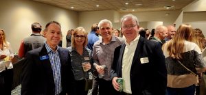 Men and women at the Coast Chamber Mixer 2024