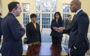 Maryland Gov. Wes Moore, right, meets with Lt. Gov. Aruna Miller, center right, House Speaker Adrienne Jones, center left, and Senate President Bill Ferguson, left, at the governor's residence in January. Moore on Thursday outlined a plan he said would revitalize state government and reflect his top priorities. (AP File Photo/Bryan Woolston)