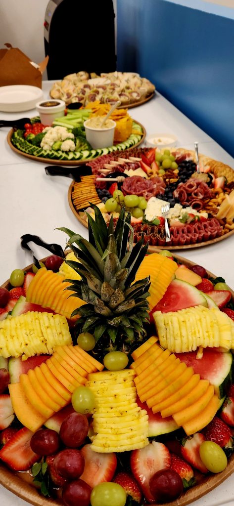 Large fruit platter at the ribbon cutting party