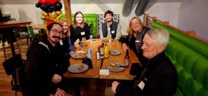 Family dining at ribbon cutting event for Guidos