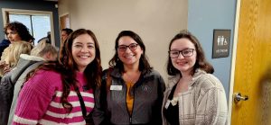 Three women standing together