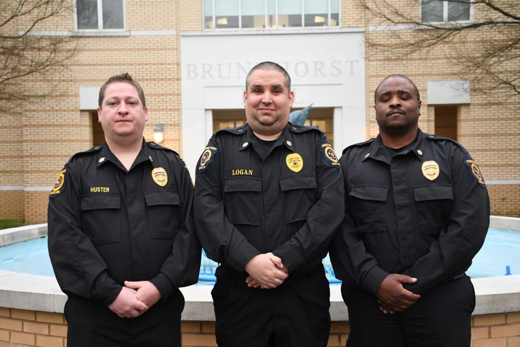 Three police officers standing together