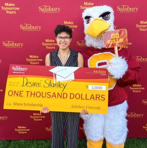 Student with Sammy the Seagull