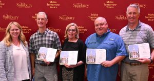 Salisbury University Staff holding awards