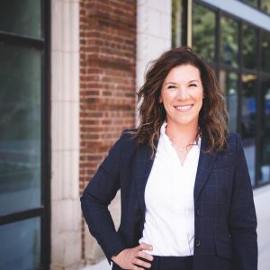 Headshot of a female real estate agent