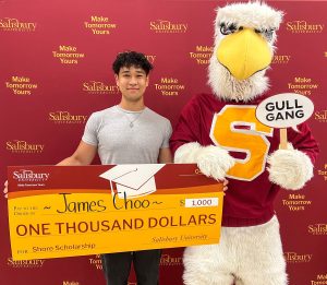 Student with Sammy the Seagull