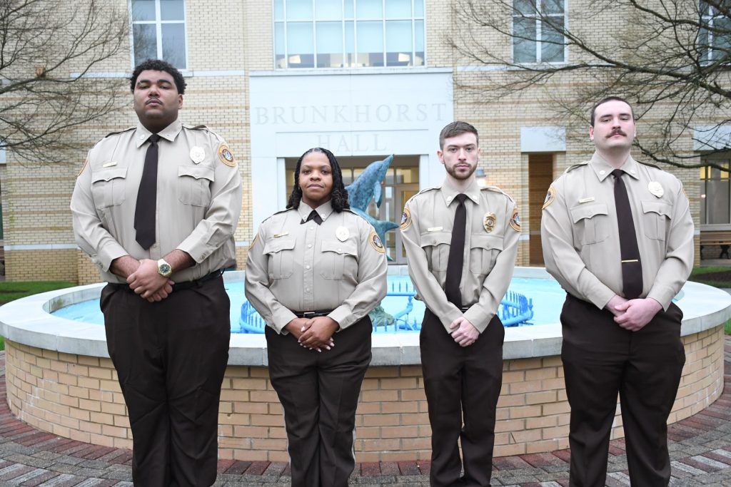 Four police officers standing together