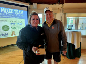 Ladies Closest to the Pin winner Caitlyn Evans, with Presenting Sponsor team Pohanka Automotive